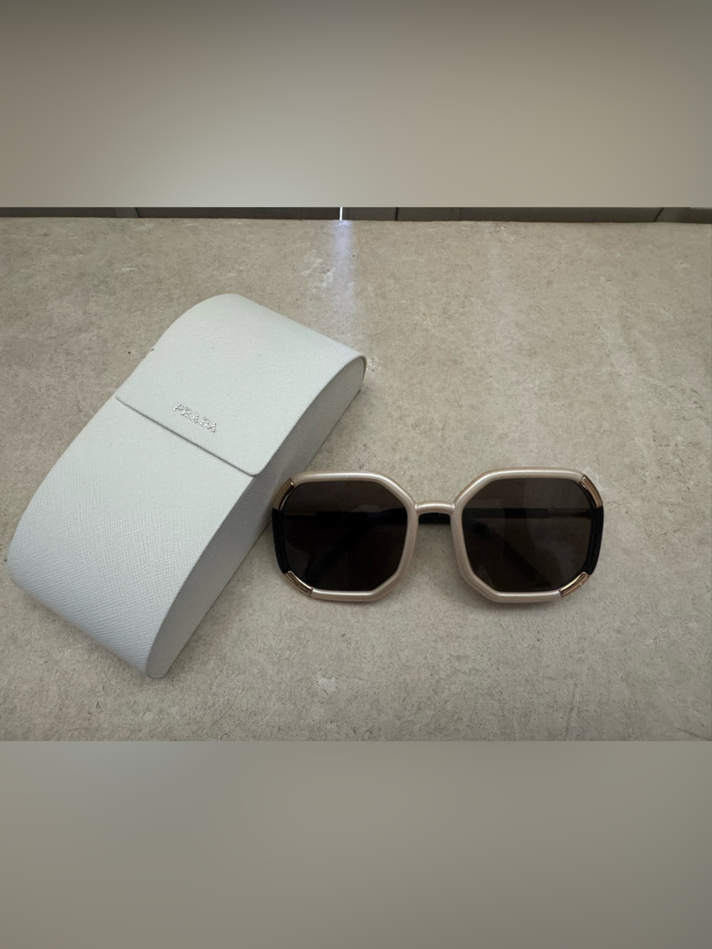 Prada Women's Beige Frame Sunglasses with Dark Lenses and Gold Accents